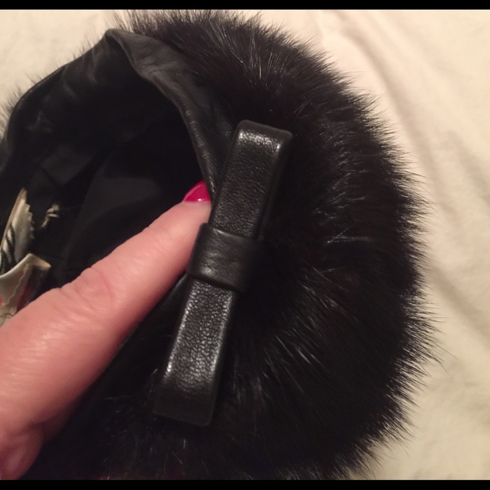 Black mink beret with leather trim.